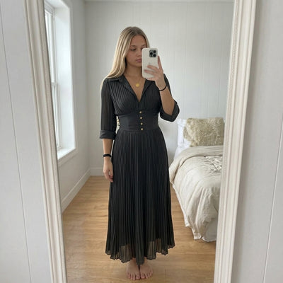 Laura M.