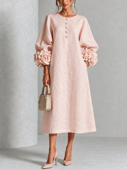Vestido Midi Rosa con Botones de Flor y Mangas Florales Extravagantes