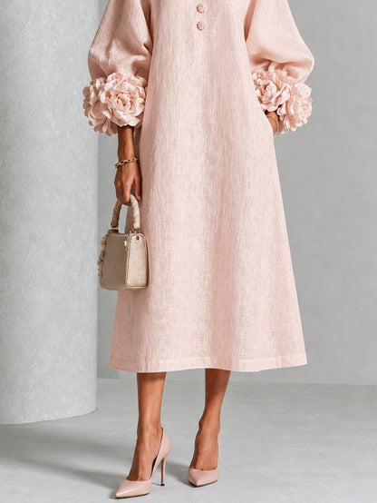 Vestido Midi Rosa con Botones de Flor y Mangas Florales Extravagantes