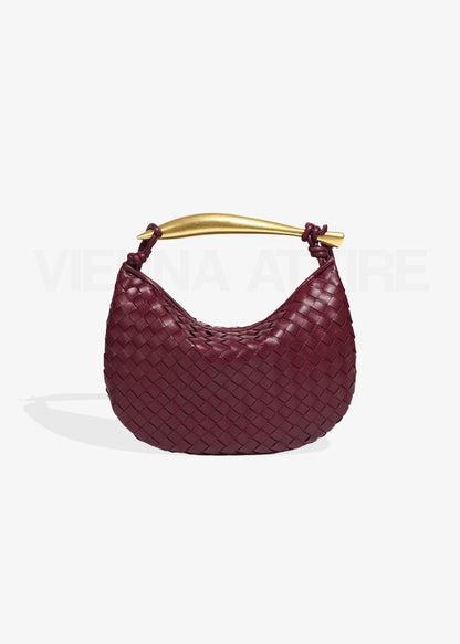 Alejandra – Bolso trenzado con asa dorada
